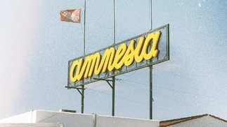 Photo of the big yellow sign on the roof of Amnesia Ibiza