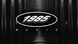 the 1985 music logo on a black background