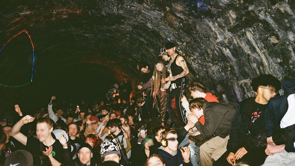 Photo of a ravers at a free party in a tunnel